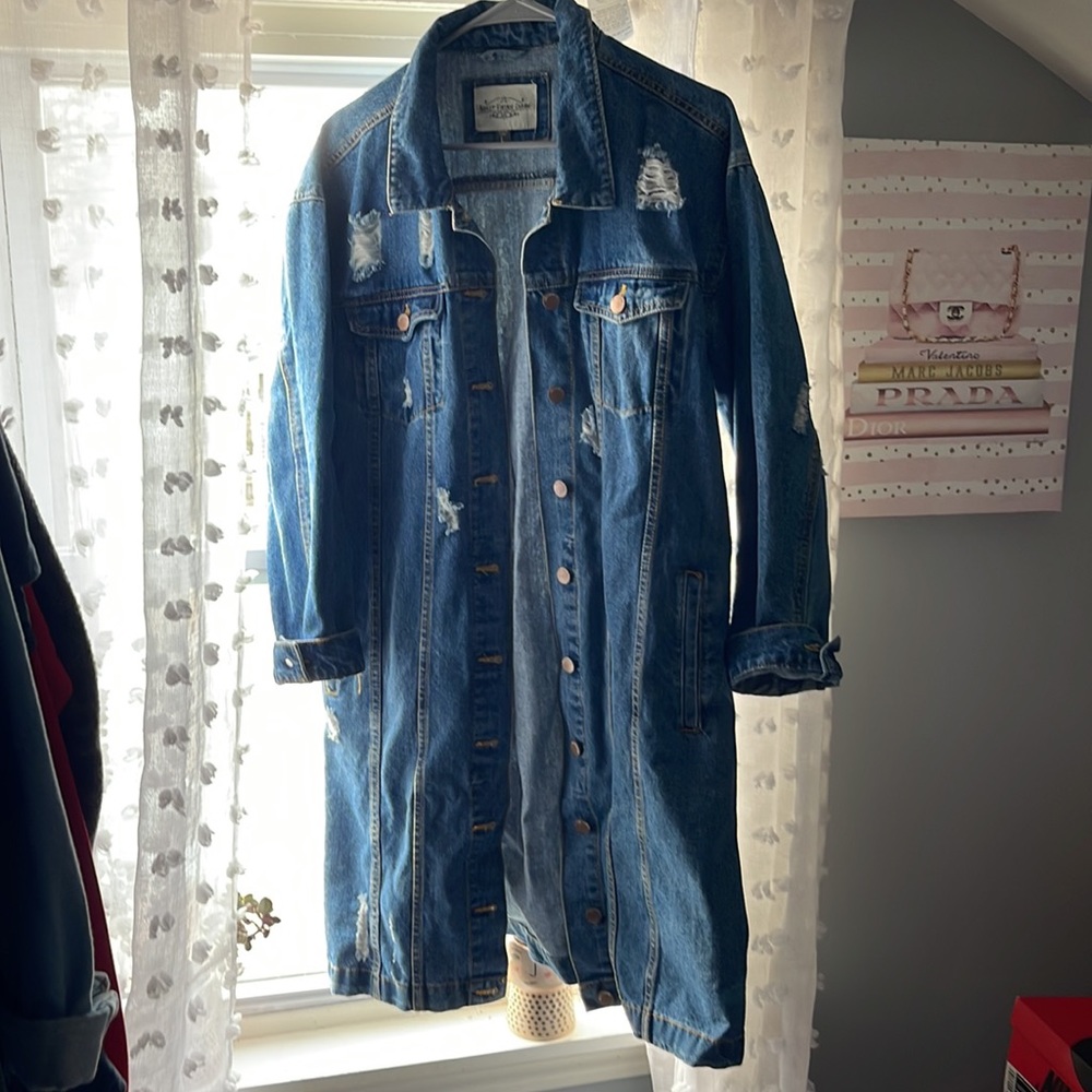 Distressed long jean jacket